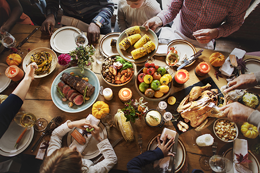 Photo of a holiday feast for "Holiday Horrors for Adult Children of Divorce - A Toolkit of Options" by RawPixel via iStock.